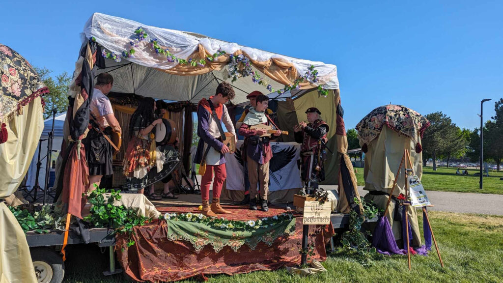 Washington Shakespearean Festival performers performing at a Ren Faire